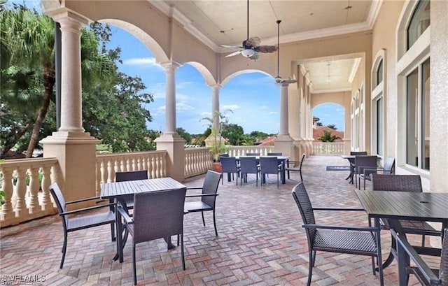 view of patio / terrace with outdoor dining space and ceiling fan