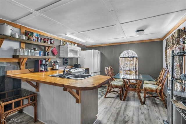 268 Mamie St, Chokoloskee, FL 34138 - kitchen featuring wood finished floors, a sink, white appliances, butcher block counters, and coffered ceiling