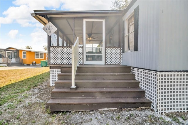268 Mamie St, Chokoloskee, FL 34138 - wooden deck with a yard and a ceiling fan