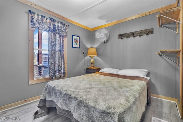 268 Mamie St, Chokoloskee, FL 34138 - bedroom featuring baseboards and wood finished floors