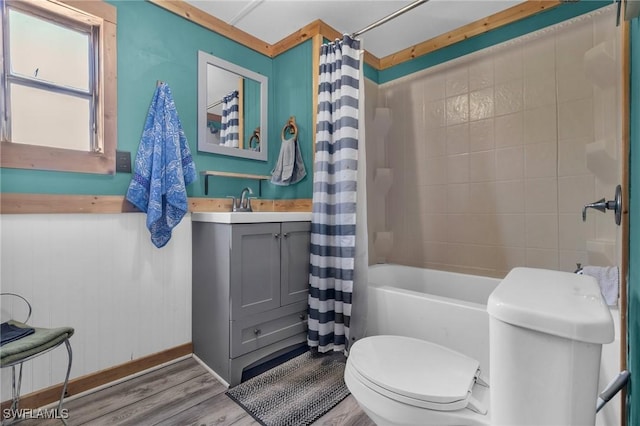 268 Mamie St, Chokoloskee, FL 34138 - bathroom featuring shower / tub combo with curtain, wood finished floors, vanity, and toilet