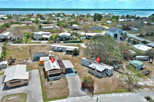 268 Mamie St, Chokoloskee, FL 34138 - birds eye view of property featuring a residential view and a water view