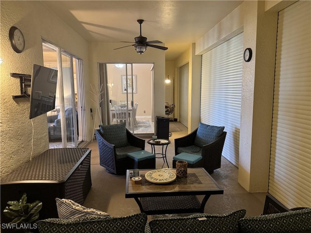 3323 SW 25th Ct, Cape Coral, FL 33914 - interior space featuring a wealth of natural light, a ceiling fan, and a textured wall