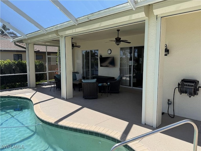 3323 SW 25th Ct, Cape Coral, FL 33914 - outdoor pool with glass enclosure, a patio, ceiling fan, and outdoor dining area