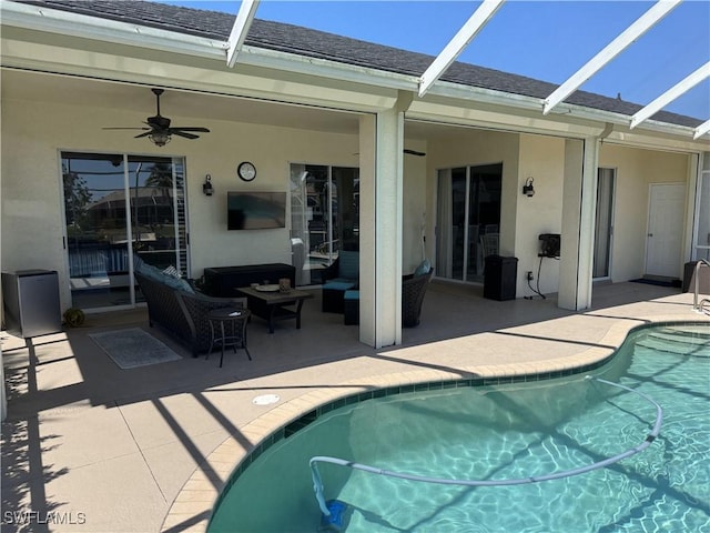 3323 SW 25th Ct, Cape Coral, FL 33914 - outdoor pool with glass enclosure, a ceiling fan, a patio, and an outdoor living space