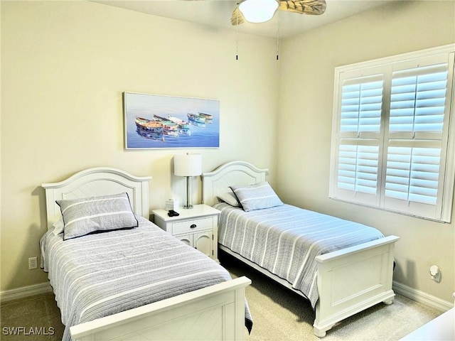 3323 SW 25th Ct, Cape Coral, FL 33914 - carpeted bedroom featuring baseboards