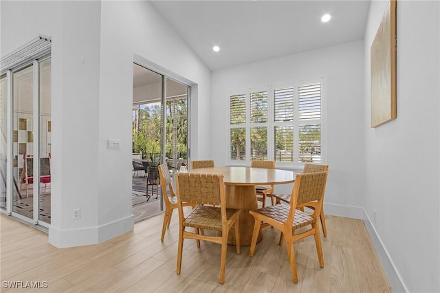 595 31st St NW, Naples, FL 34120 - dining space featuring light wood-style floors, baseboards, and recessed lighting