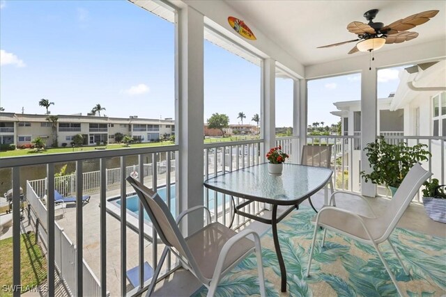sunroom with a residential view