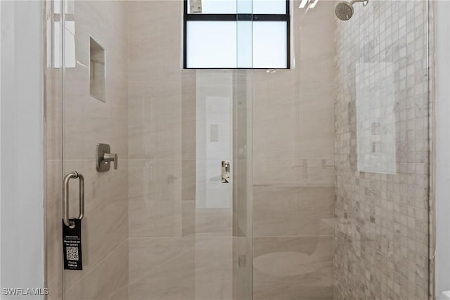 full bath featuring a stall shower