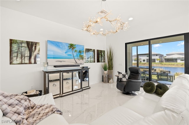 20321 Fair Oak Ln, Estero, FL 33928 - living room featuring marble finish floor, a notable chandelier, and visible vents