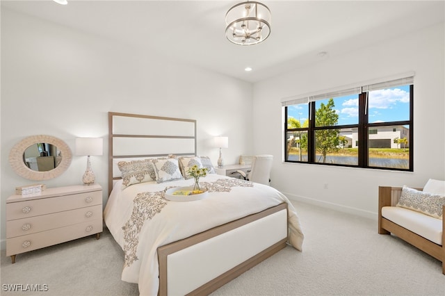20321 Fair Oak Ln, Estero, FL 33928 - carpeted bedroom with baseboards, an inviting chandelier, and recessed lighting