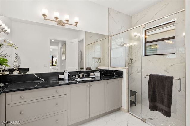 20321 Fair Oak Ln, Estero, FL 33928 - full bath featuring a wealth of natural light, marble finish floor, vanity, and a marble finish shower