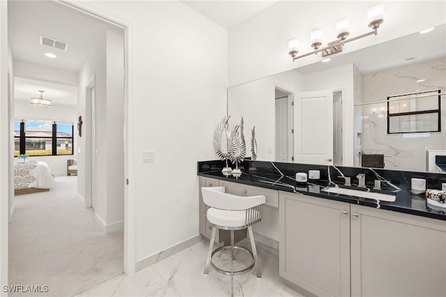 20321 Fair Oak Ln, Estero, FL 33928 - ensuite bathroom with recessed lighting, marble finish floor, visible vents, a marble finish shower, and baseboards