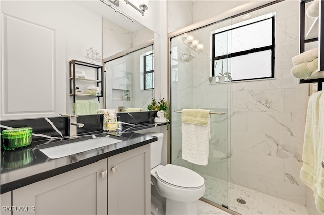 20321 Fair Oak Ln, Estero, FL 33928 - bathroom with marble finish floor, toilet, vanity, and a marble finish shower