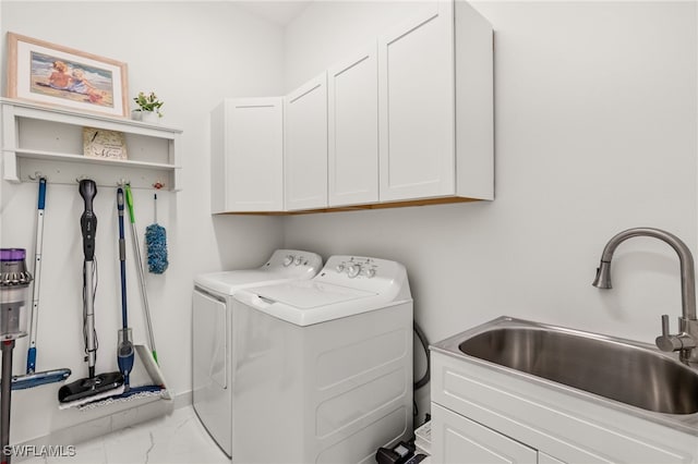 20321 Fair Oak Ln, Estero, FL 33928 - laundry room with marble finish floor, cabinet space, a sink, and independent washer and dryer