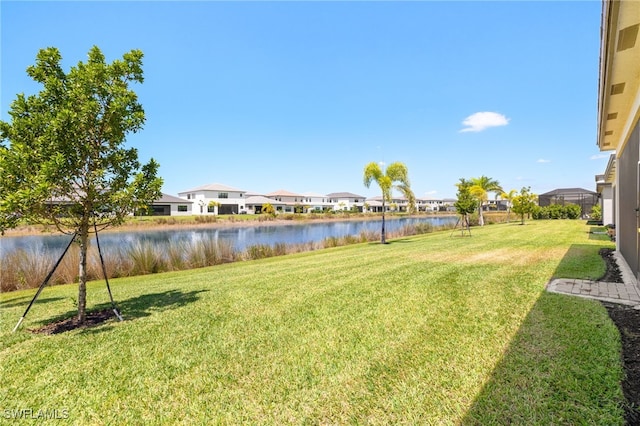 20321 Fair Oak Ln, Estero, FL 33928 - view of yard featuring a water view and a residential view