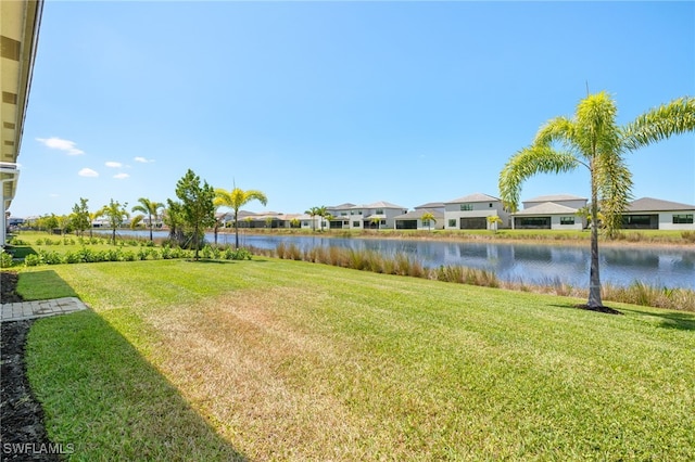 20321 Fair Oak Ln, Estero, FL 33928 - view of yard with a residential view and a water view