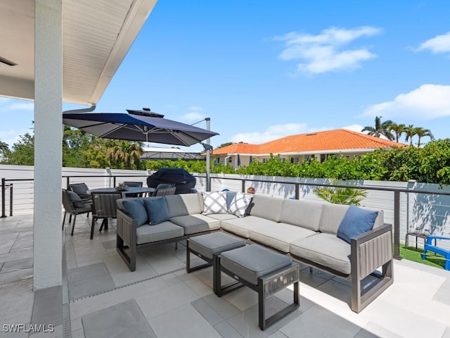 view of patio with outdoor lounge area and area for grilling