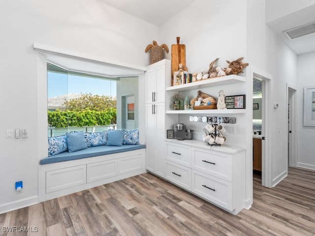 mudroom featuring visible vents and light wood-style flooring