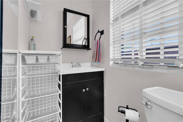 264 Mamie St, Chokoloskee, FL 34138 - half bath featuring toilet, vanity, and baseboards