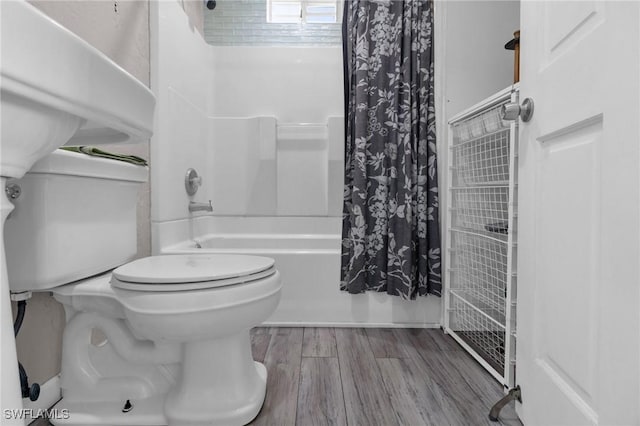 264 Mamie St, Chokoloskee, FL 34138 - full bath with toilet, wood finished floors, and shower / tub combo with curtain