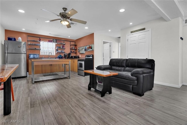 264 Mamie St, Chokoloskee, FL 34138 - living area featuring light wood finished floors, baseboards, recessed lighting, and ceiling fan