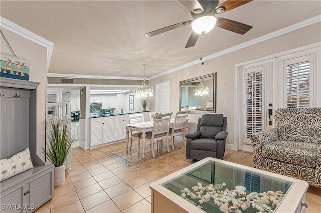 4111 Gunnison Ct Unit 1212, Estero, FL 33928 - living room with crown molding, light tile patterned floors, visible vents, and ceiling fan with notable chandelier