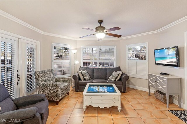 4111 Gunnison Ct Unit 1212, Estero, FL 33928 - living room featuring crown molding, light tile patterned floors, ceiling fan, and baseboards