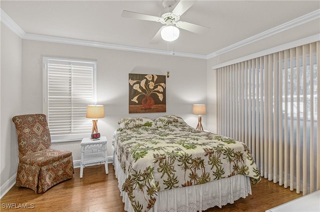 4111 Gunnison Ct Unit 1212, Estero, FL 33928 - bedroom with ceiling fan, baseboards, crown molding, and wood finished floors