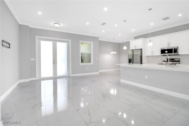 4140 31st Ave NE, Naples, FL 34120 - kitchen featuring marble finish floor, visible vents, appliances with stainless steel finishes, and ornamental molding