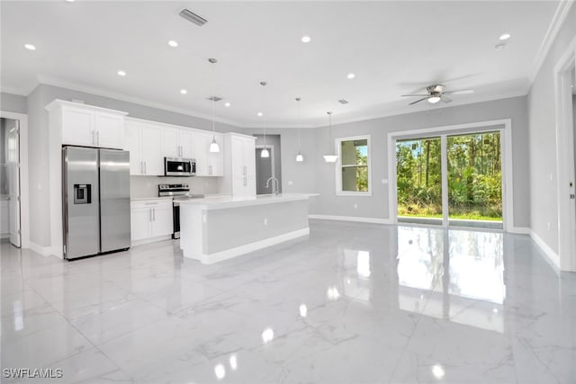 4140 31st Ave NE, Naples, FL 34120 - kitchen with baseboards, ornamental molding, and stainless steel appliances