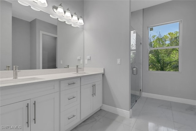 4140 31st Ave NE, Naples, FL 34120 - full bath featuring a healthy amount of sunlight, marble finish floor, and a sink