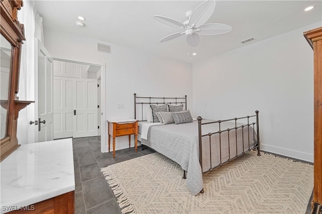 8241 Main St, Bokeelia, FL 33922 - bedroom featuring recessed lighting, a ceiling fan, baseboards, and dark tile patterned floors