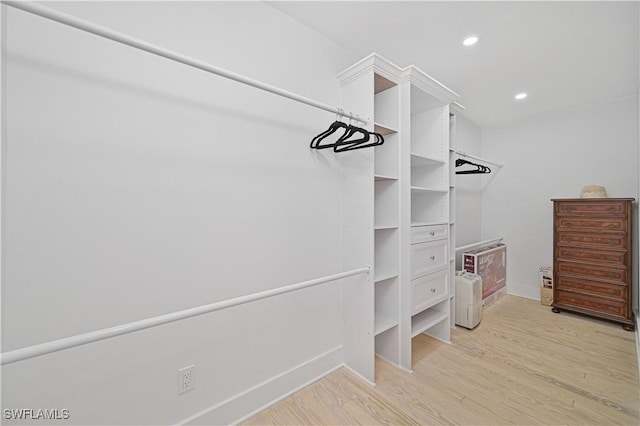 8241 Main St, Bokeelia, FL 33922 - spacious closet with light wood-style flooring