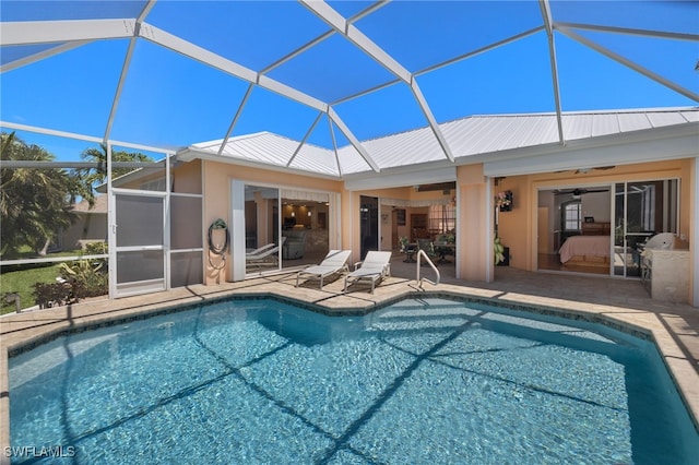 5302 SW 27th Pl, Cape Coral, FL 33914 - swimming pool featuring a patio area, ceiling fan, and glass enclosure