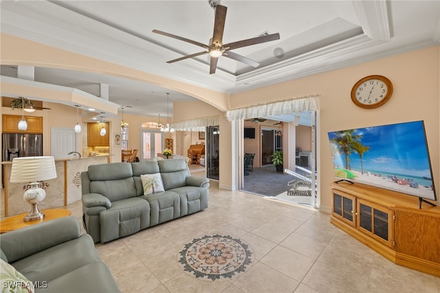 5302 SW 27th Pl, Cape Coral, FL 33914 - living room featuring crown molding, ceiling fan, arched walkways, a tray ceiling, and light tile patterned flooring