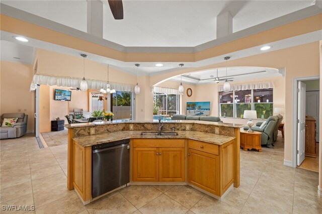 5302 SW 27th Pl, Cape Coral, FL 33914 - kitchen with dishwashing machine, open floor plan, a sink, crown molding, and light stone countertops