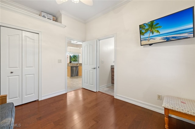 5302 SW 27th Pl, Cape Coral, FL 33914 - unfurnished bedroom featuring ornamental molding, dark wood finished floors, baseboards, a closet, and a ceiling fan