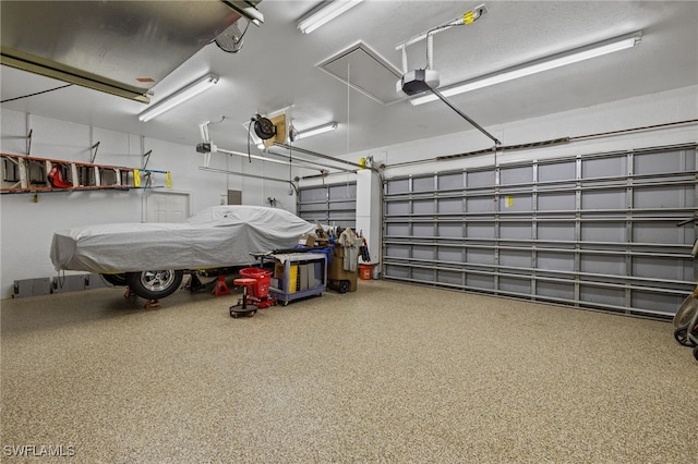 5302 SW 27th Pl, Cape Coral, FL 33914 - garage with a garage door opener