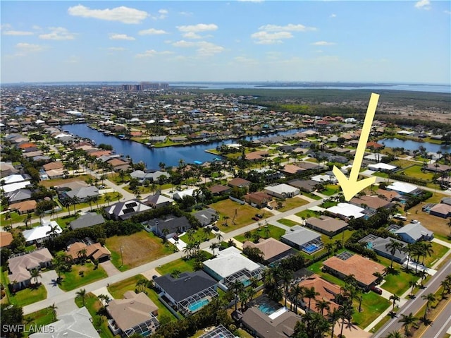 5302 SW 27th Pl, Cape Coral, FL 33914 - aerial overview of property's location with a large body of water and nearby suburban area