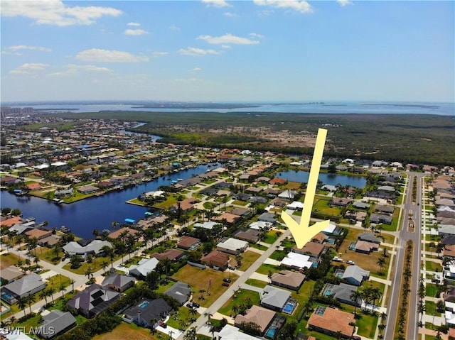 5302 SW 27th Pl, Cape Coral, FL 33914 - aerial overview of property's location with a large body of water and nearby suburban area