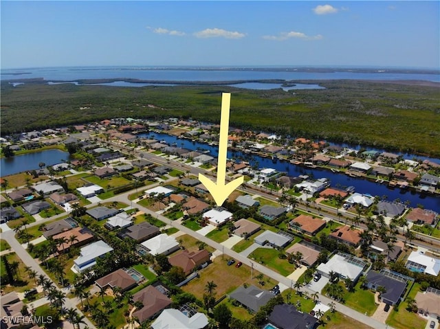 5302 SW 27th Pl, Cape Coral, FL 33914 - aerial overview of property's location featuring a large body of water and nearby suburban area