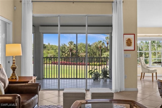 6095 Pinnacle Ln Unit 1304, Naples, FL 34110 - entryway featuring tile patterned flooring and baseboards