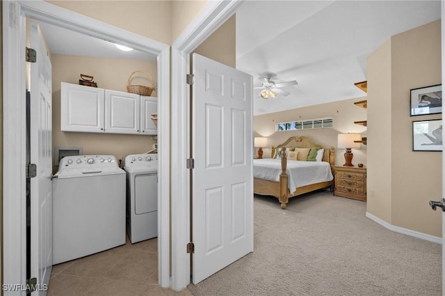 6095 Pinnacle Ln Unit 1304, Naples, FL 34110 - interior space with light carpet, washing machine and dryer, baseboards, a ceiling fan, and light tile patterned floors
