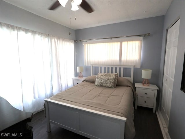 9170 24th Pl, Sunrise, FL 33322 - bedroom featuring a ceiling fan and wood finished floors
