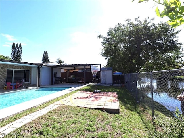 9170 24th Pl, Sunrise, FL 33322 - view of pool with a patio, a fenced in pool, fence, and a lawn