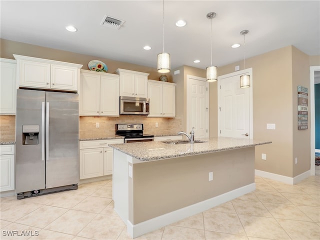 13530 Villa Di Preserve Ln, Estero, FL 33928 - kitchen featuring appliances with stainless steel finishes, tasteful backsplash, light tile patterned flooring, and recessed lighting