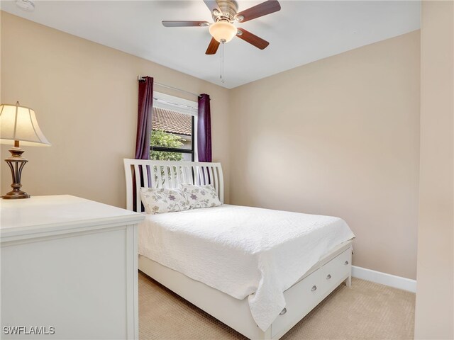 13530 Villa Di Preserve Ln, Estero, FL 33928 - bedroom featuring light carpet and ceiling fan