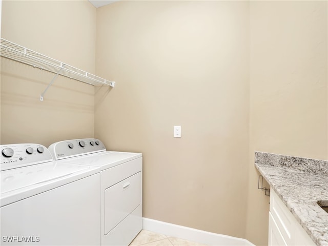 13530 Villa Di Preserve Ln, Estero, FL 33928 - laundry area with washer and dryer and light tile patterned floors