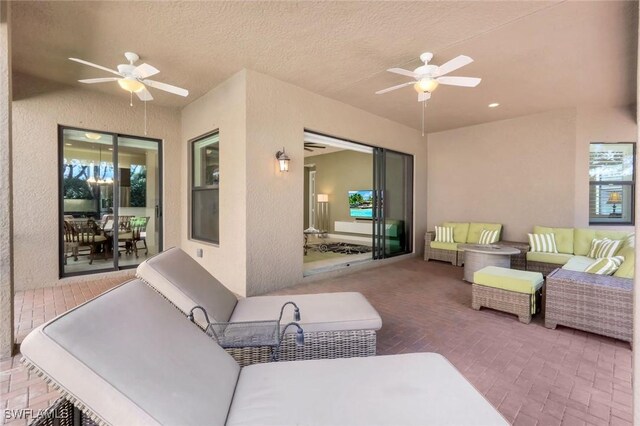 3267 Pacific Dr, Naples, FL 34119 - view of patio / terrace with a ceiling fan and an outdoor hangout area